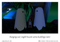 A print of 2 ghosts surrounding a user.