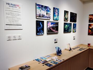 Exhibition space at Wonder Photo Shop showing WALL DECOR prints and printed goods.